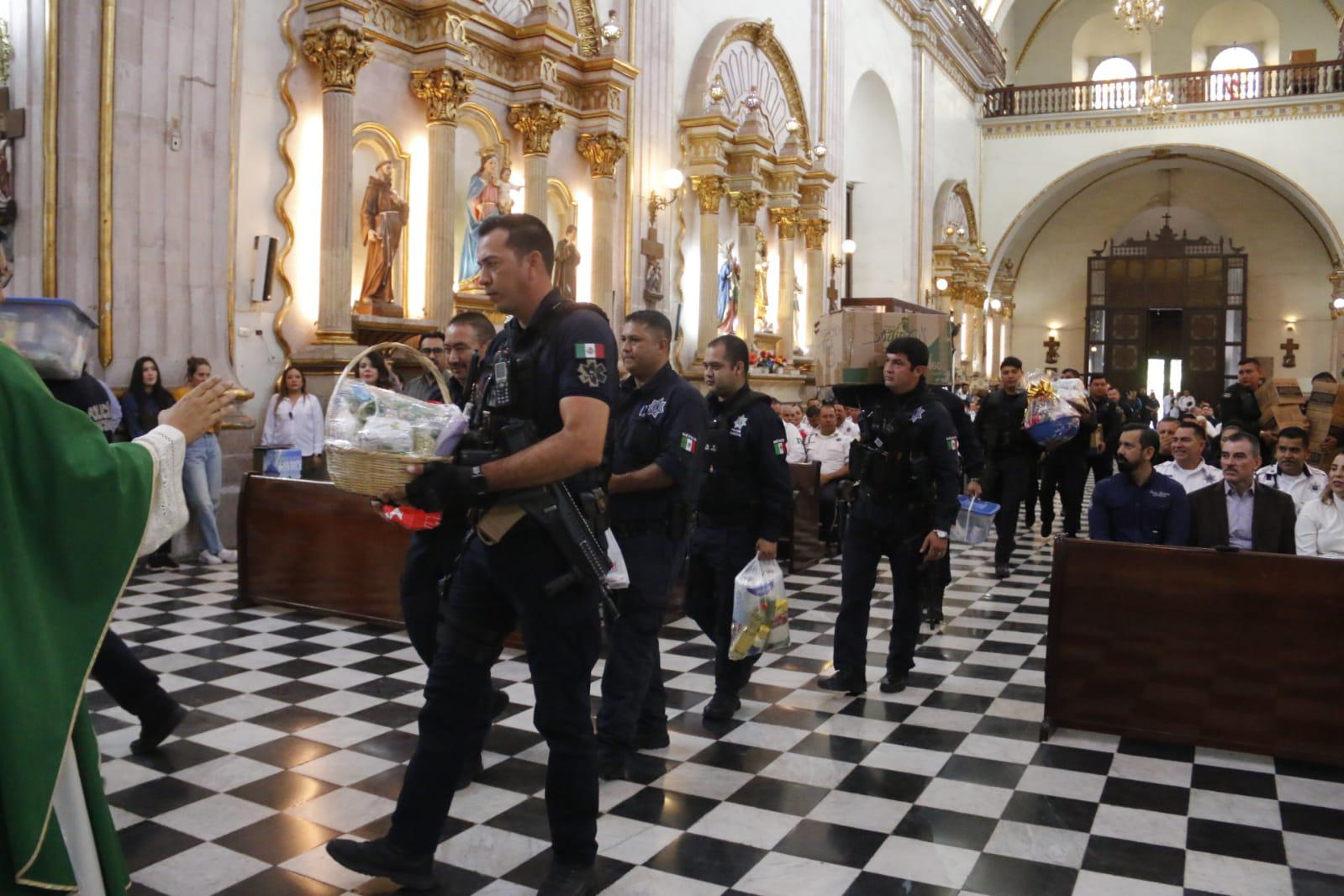 $!Celebran misa de acción de gracias por Día del Policía en Culiacán