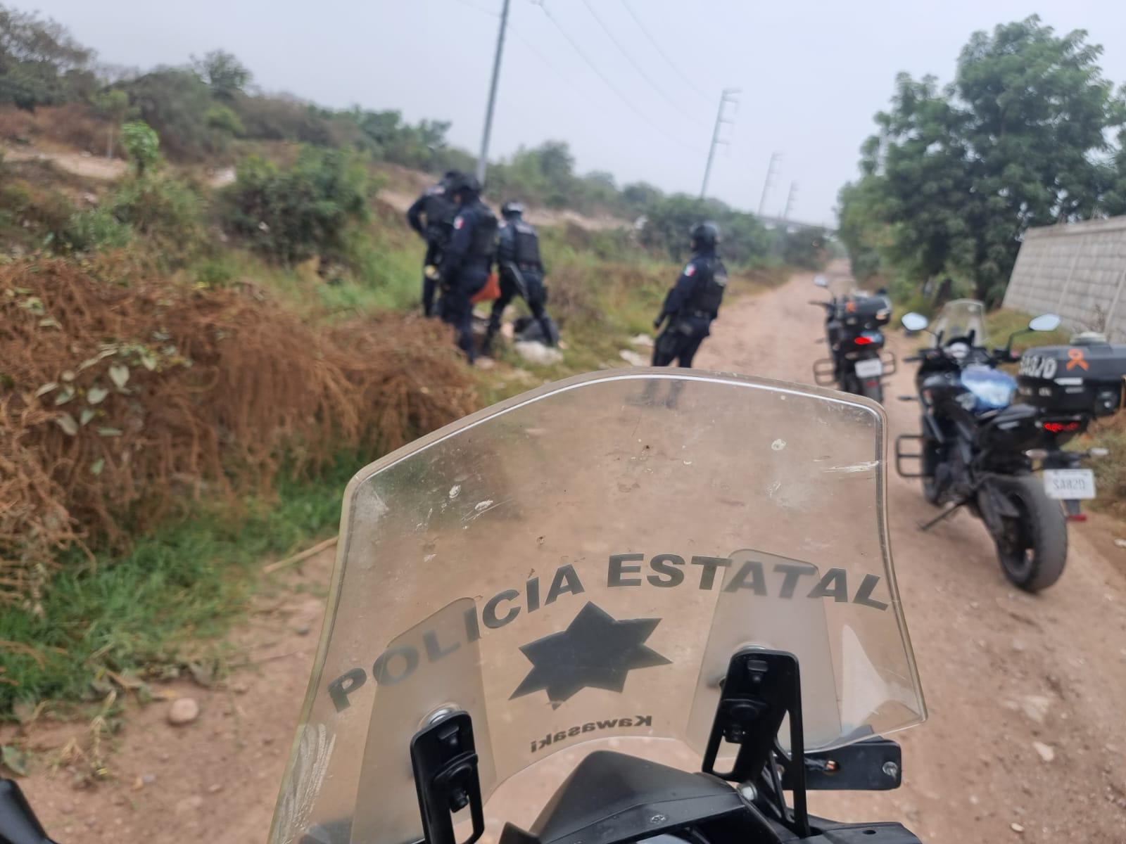 $!Hallan a hombre asesinado en dren, al sur de de Culiacán