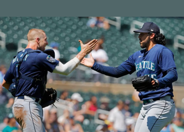 Andrés Muñoz retiró el último inning para acreditarse el rescate.