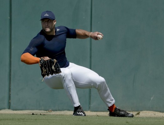 Tim Tebow entrenó la semana pasada en la Universidad del Sur de California.