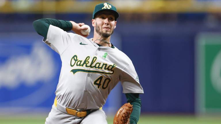 Mitch Spence coqueteó con el no-no y Atléticos blanquearon a Rays