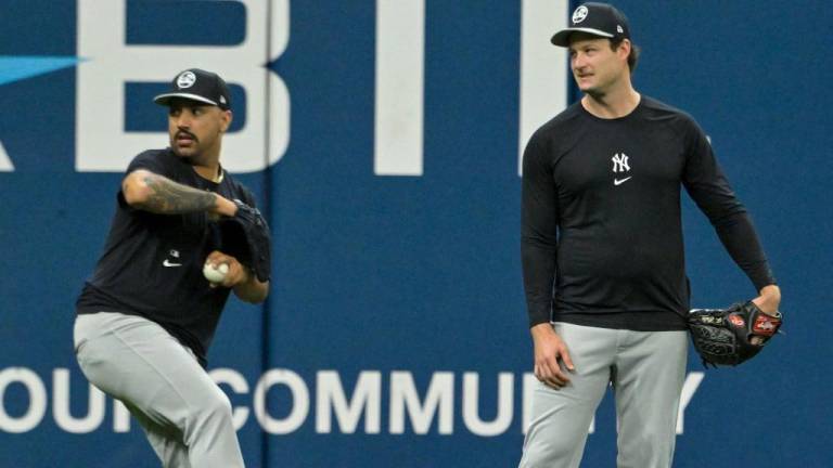 Gerrit Cole (derecha) será el abridor del Juego 1 de la Serie Mundial.