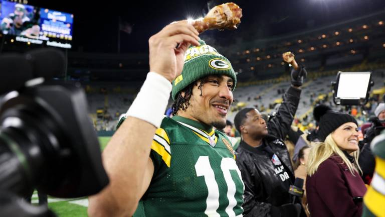 Los Green Bay Packers celebran su triunfo en Acción de Gracias.