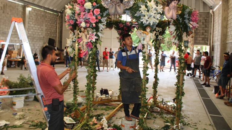 Lo más pesado es llevar el paso de la gente: cargadores de la Virgen del Rosario