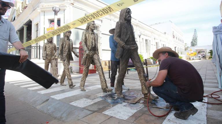 Los Beatles, en el callejón Liverpool, reciben trabajos de pintura para quedar listos ante la próxima Convención Anual de la Asociación de Cruceros de Florida y el Caribe (FCCA), que inicia este martes.