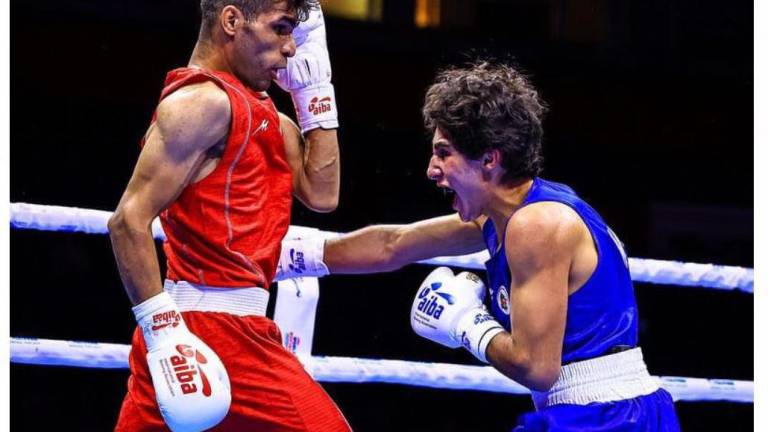 El joven mazatleco, Marco Verde, derecha, participó en el Campeonato Mundial de Boxeo, en Belgrado, Serbia.