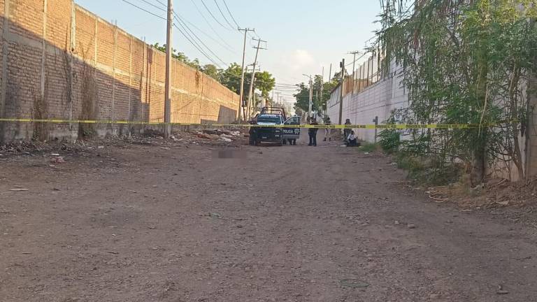 Calle donde fue localizado un hombre de aspecto joven asesinado a balazos.