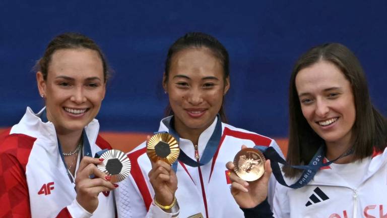 Las ganadoras de las medallas en el tenis femenil.