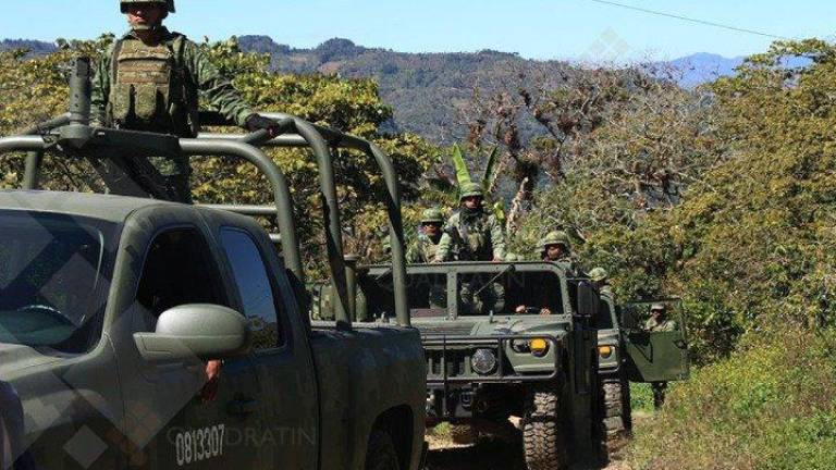 Vinculan a proceso a 14 civiles detenidos en San Ignacio por portación de armamento