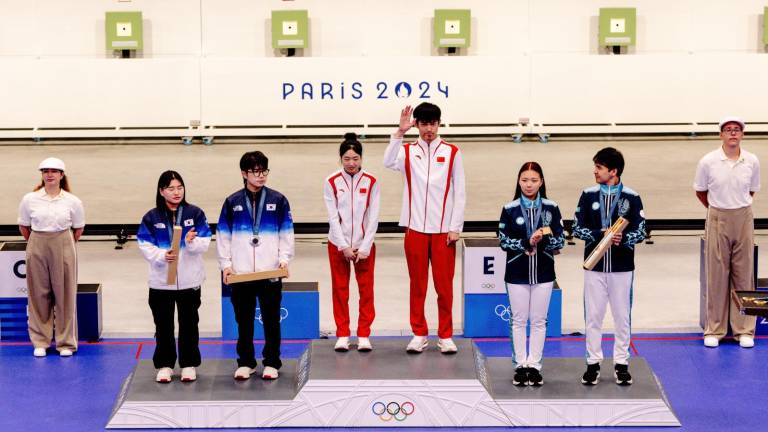 Sheng Lihao y Huang Yuting suben a lo más alto del podio.