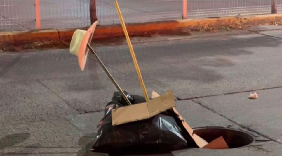 $!Reportan bulto con sombrero en plena Ciudades Hermanas, lo confunden con cadáver